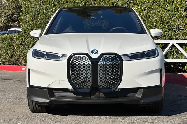 new 2025 BMW iX car, priced at $94,610