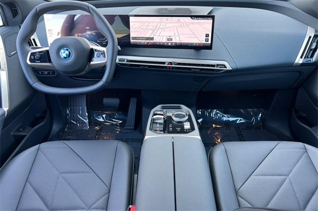 new 2025 BMW iX car, priced at $94,610