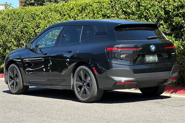 used 2024 BMW iX car, priced at $74,999
