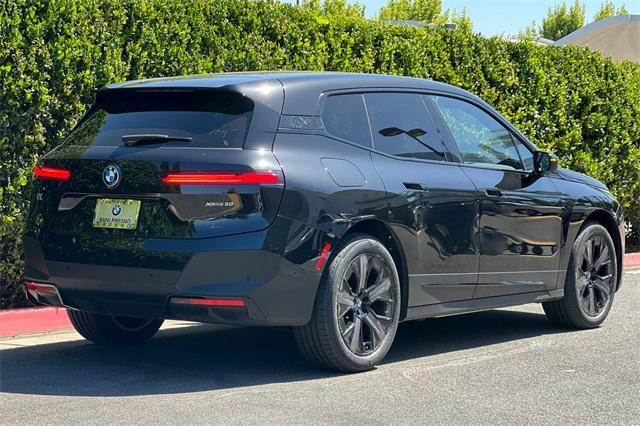 used 2024 BMW iX car, priced at $74,999