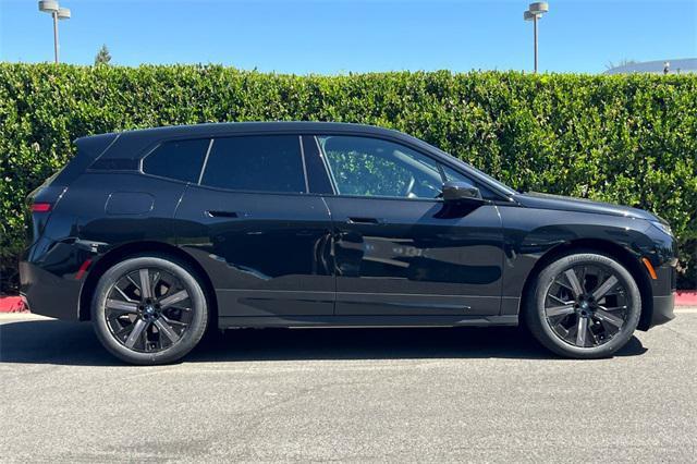 used 2024 BMW iX car, priced at $74,999
