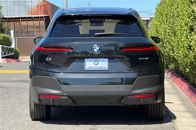 used 2024 BMW iX car, priced at $74,999