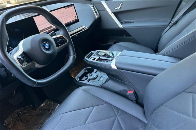 used 2024 BMW iX car, priced at $74,999