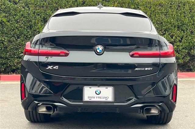 new 2025 BMW X4 car, priced at $65,995