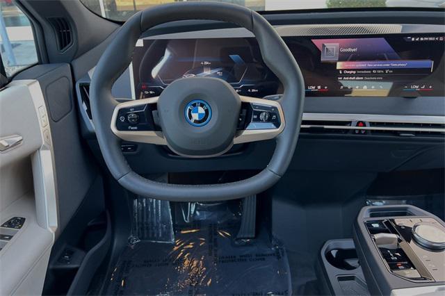 new 2025 BMW iX car, priced at $89,705