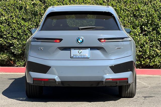 used 2024 BMW iX car, priced at $78,999