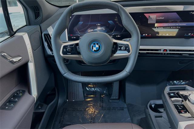 new 2025 BMW iX car, priced at $89,495