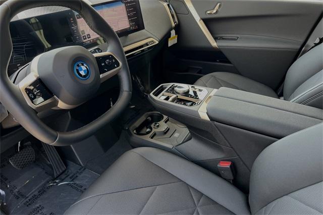 new 2025 BMW iX car, priced at $88,410