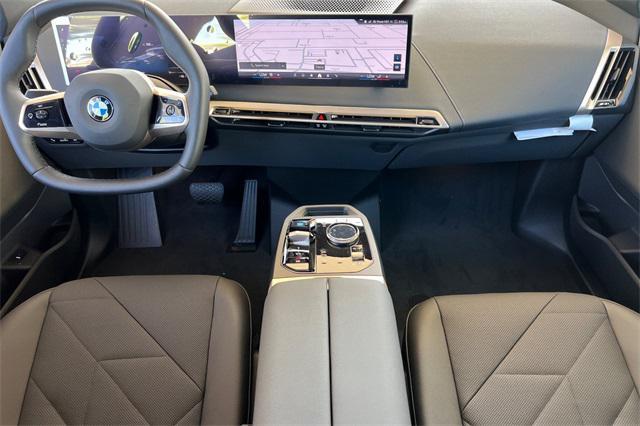 new 2026 BMW iX car, priced at $78,245