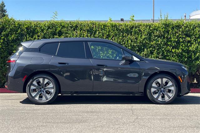 new 2026 BMW iX car, priced at $78,245
