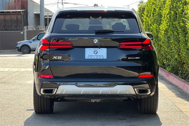 used 2025 BMW X5 car, priced at $71,930