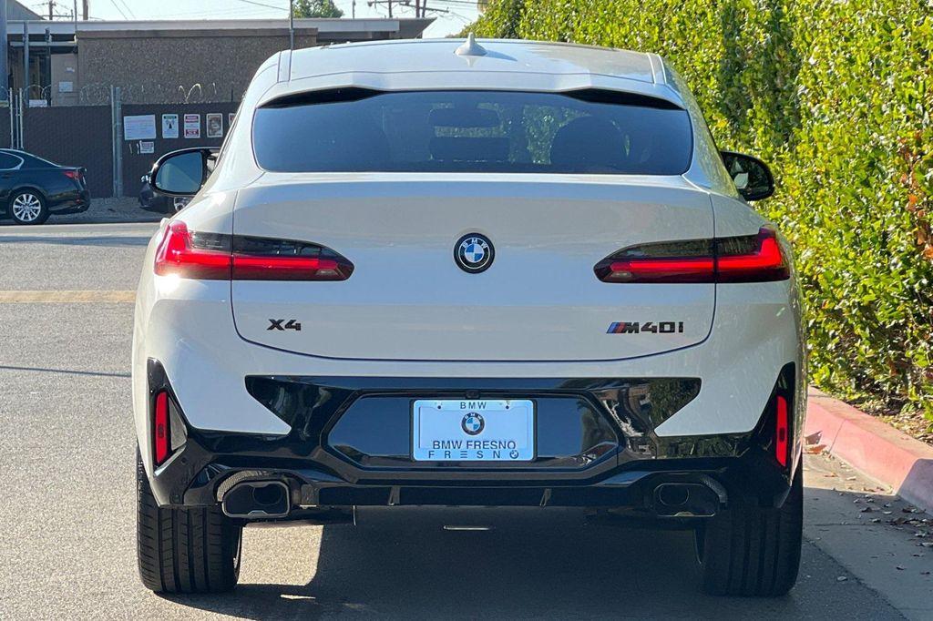 new 2025 BMW X4 car, priced at $74,365
