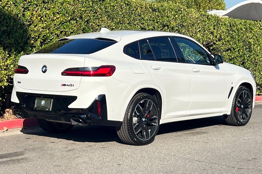 new 2025 BMW X4 car, priced at $74,365