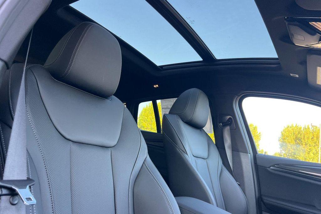 new 2025 BMW X4 car, priced at $74,365