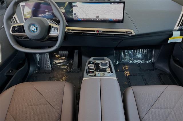 new 2025 BMW iX car, priced at $92,555