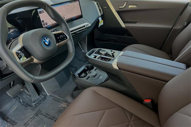 new 2025 BMW iX car, priced at $92,555