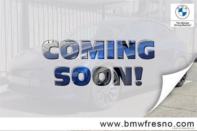 used 2025 Tesla Model Y car, priced at $42,999