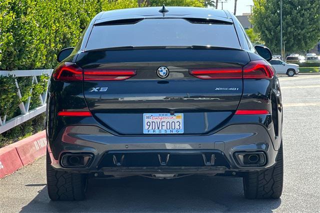 used 2023 BMW X6 car, priced at $55,999
