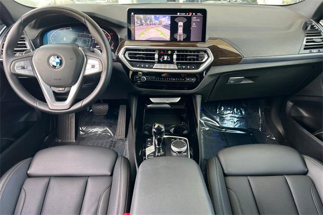 used 2023 BMW X4 car, priced at $43,999