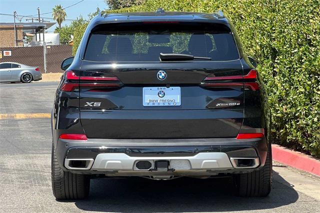 used 2024 BMW X5 PHEV car, priced at $74,999