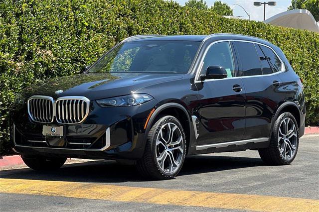 used 2024 BMW X5 PHEV car, priced at $74,999