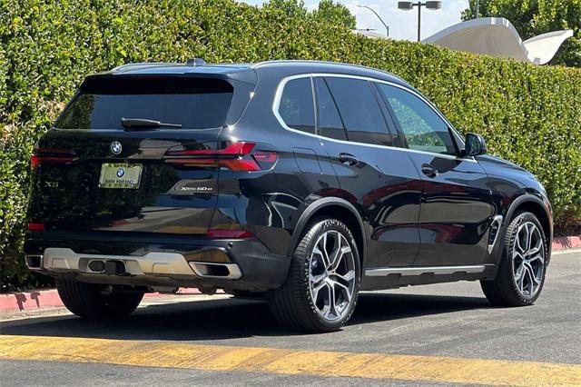 used 2024 BMW X5 PHEV car, priced at $74,999