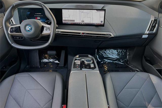 used 2024 BMW iX car, priced at $79,999