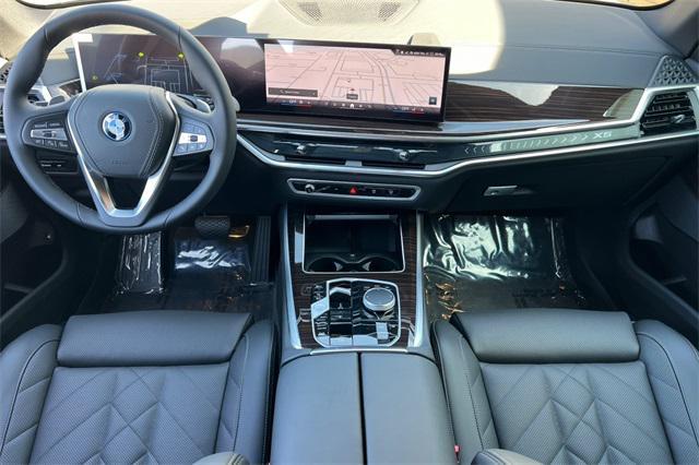 new 2025 BMW X5 PHEV car, priced at $77,720