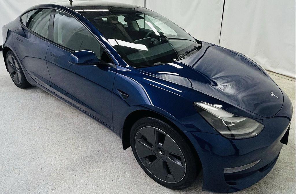 used 2023 Tesla Model 3 car, priced at $27,401