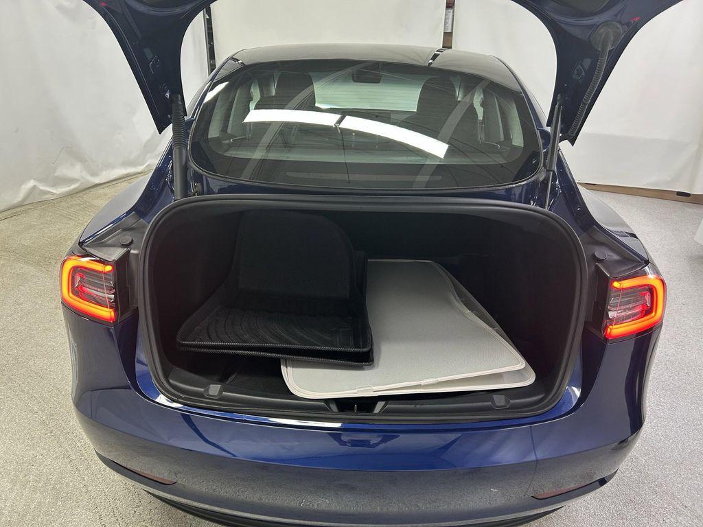 used 2023 Tesla Model 3 car, priced at $27,401