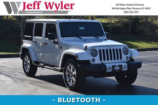 used 2016 Jeep Wrangler Unlimited car, priced at $19,554