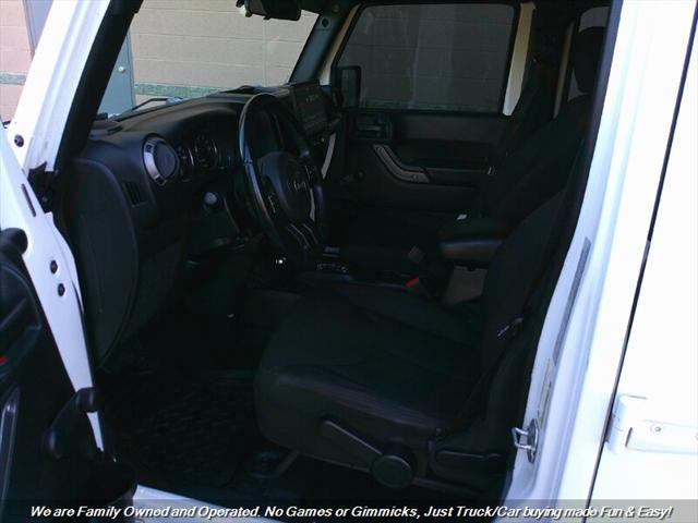 used 2018 Jeep Wrangler JK Unlimited car, priced at $21,995