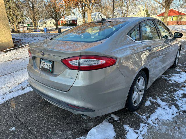 used 2015 Ford Fusion car, priced at $10,997