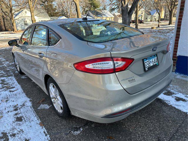 used 2015 Ford Fusion car, priced at $10,997