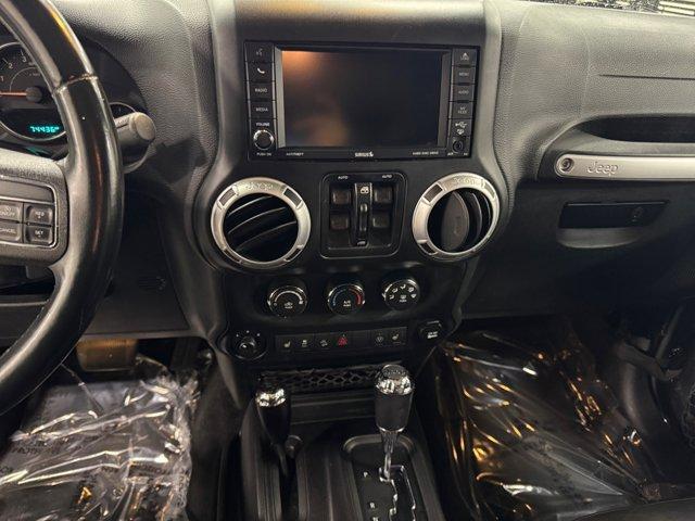 used 2015 Jeep Wrangler Unlimited car, priced at $23,495