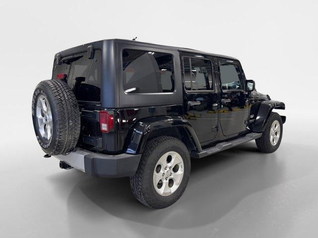 used 2015 Jeep Wrangler Unlimited car, priced at $23,495