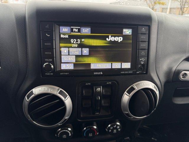 used 2015 Jeep Wrangler Unlimited car, priced at $23,495