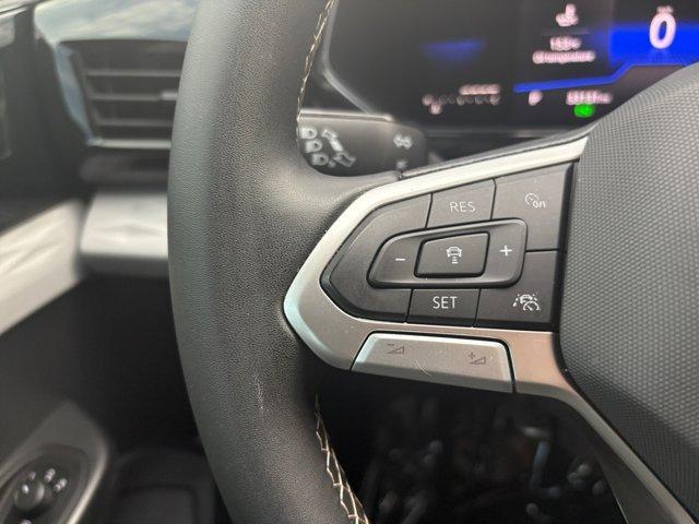 used 2023 Volkswagen Taos car, priced at $22,512