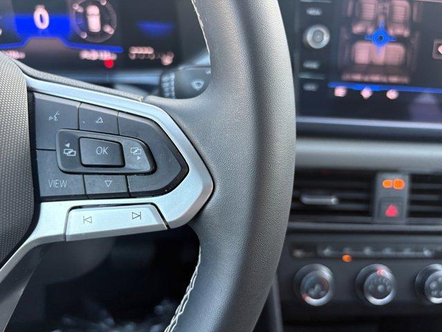 used 2022 Volkswagen Taos car, priced at $25,000