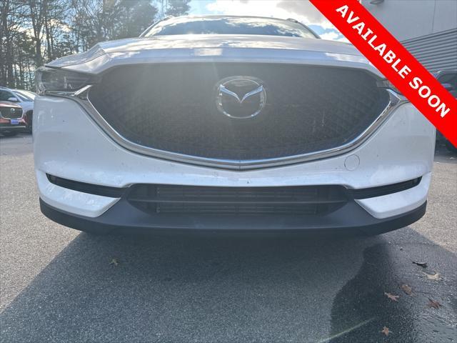 used 2021 Mazda CX-5 car, priced at $28,000