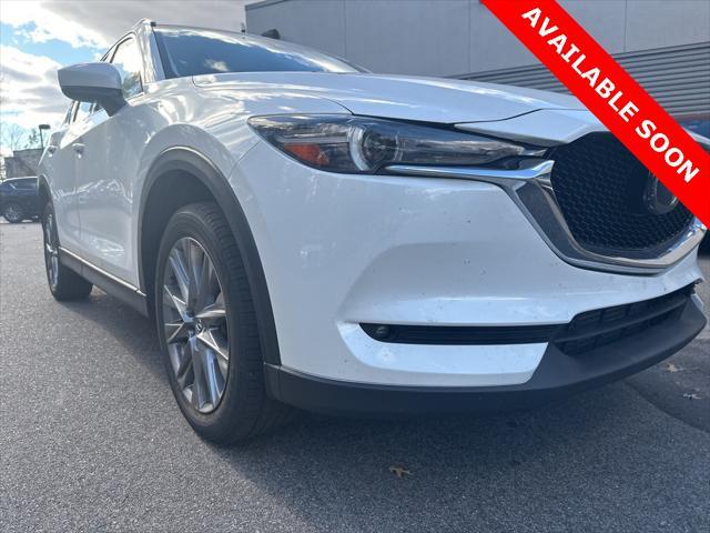 used 2021 Mazda CX-5 car, priced at $28,000