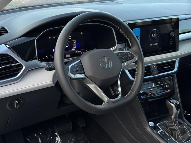 new 2025 Volkswagen Taos car, priced at $33,306