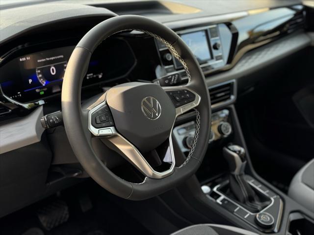 new 2024 Volkswagen Taos car, priced at $28,098