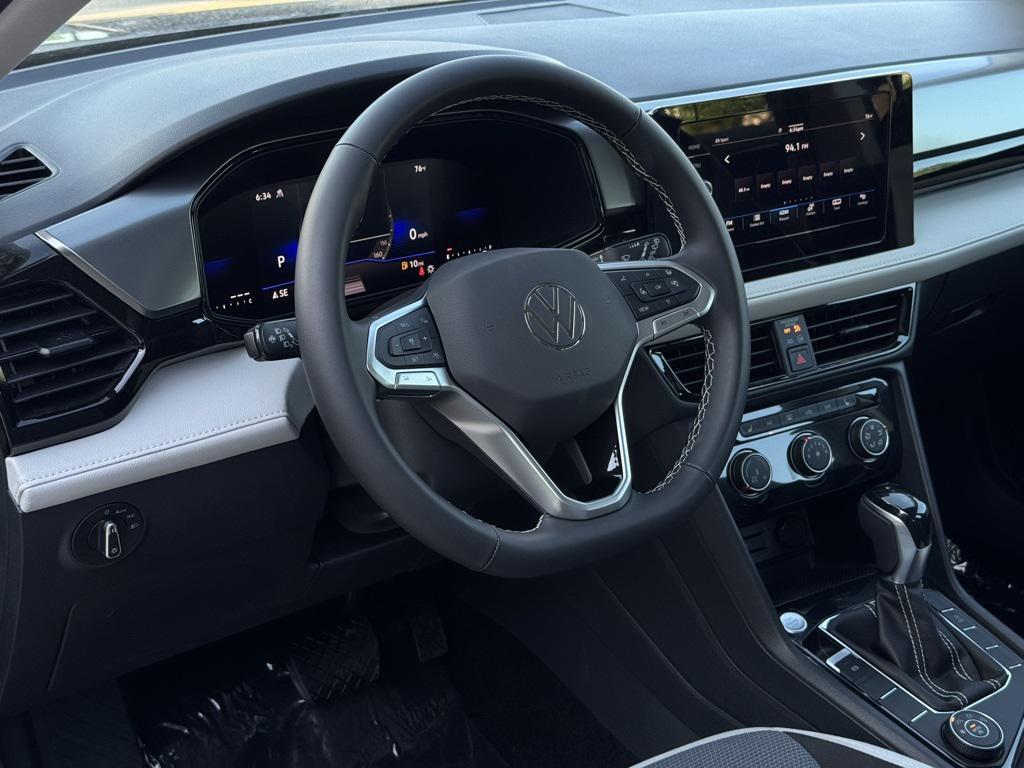 new 2025 Volkswagen Taos car, priced at $29,206