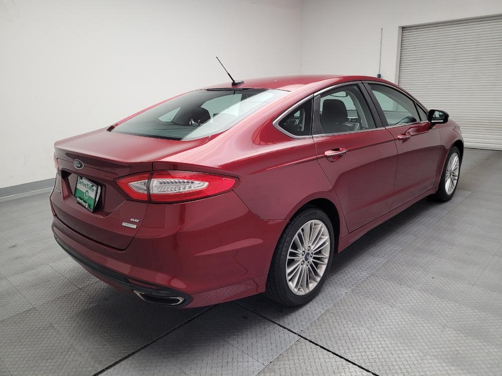used 2016 Ford Fusion car, priced at $12,195