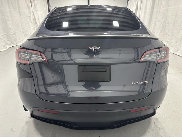used 2024 Tesla Model Y car, priced at $35,995