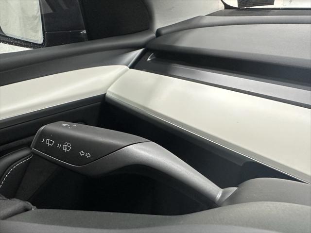 used 2024 Tesla Model Y car, priced at $35,995