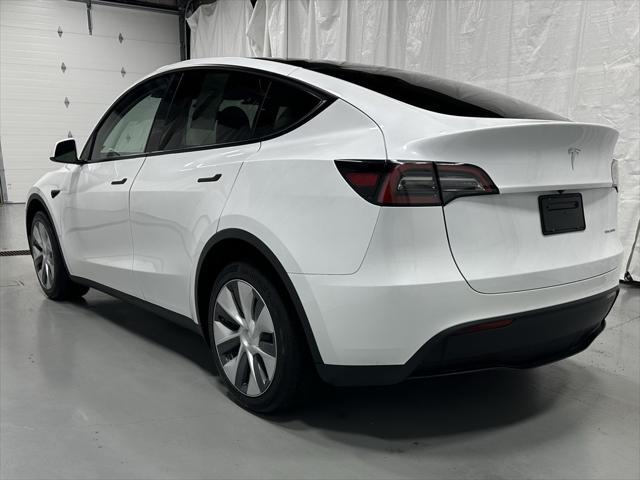 used 2023 Tesla Model Y car, priced at $32,995