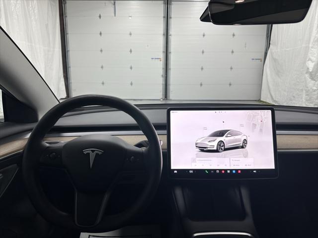 used 2023 Tesla Model 3 car, priced at $24,495