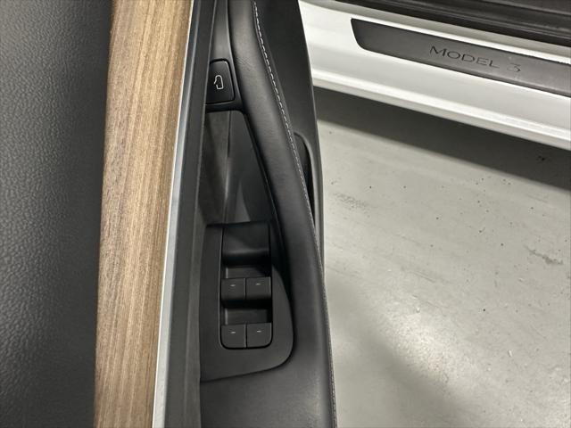 used 2023 Tesla Model 3 car, priced at $24,495